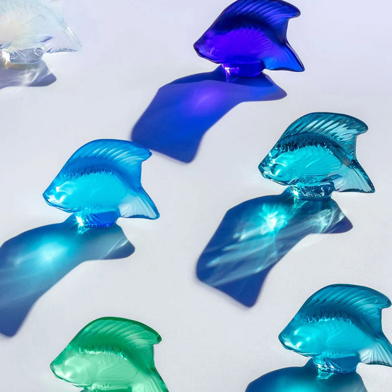 Clear glass fish sculpture figures with blue color, teal and dark blue tones