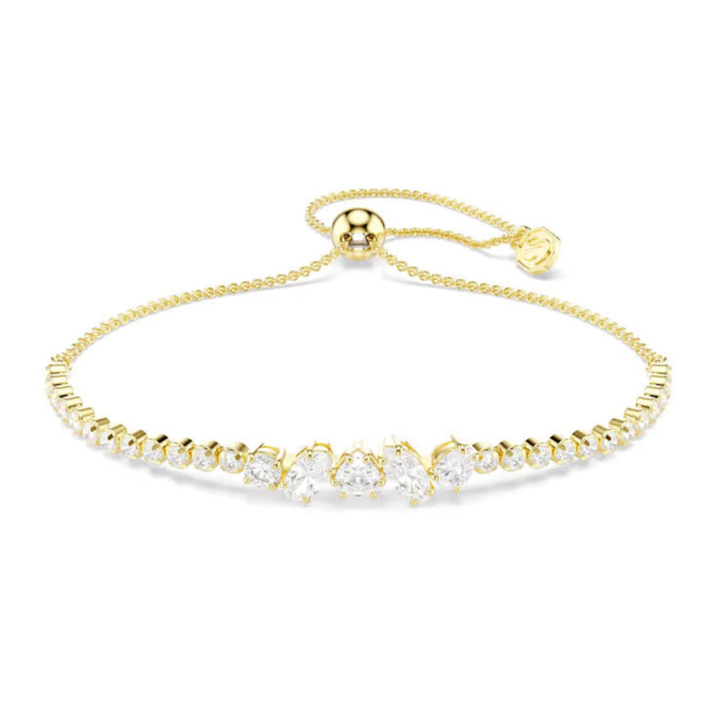 Gold bracelet with small diamonds on a white background