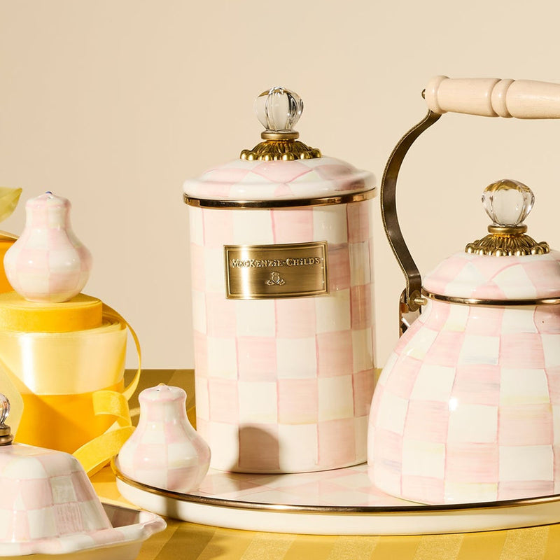 Large ceramic canister with pink check pattern and gold-trimmed lid knob