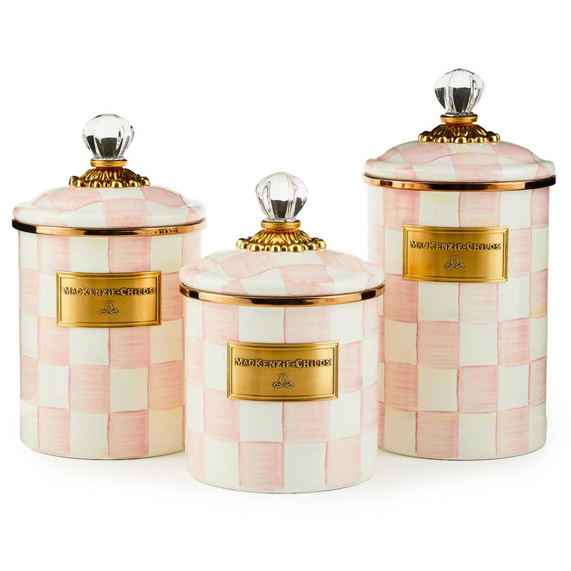 Set of three ceramic canisters, pink check pattern, gold lids with knob and label