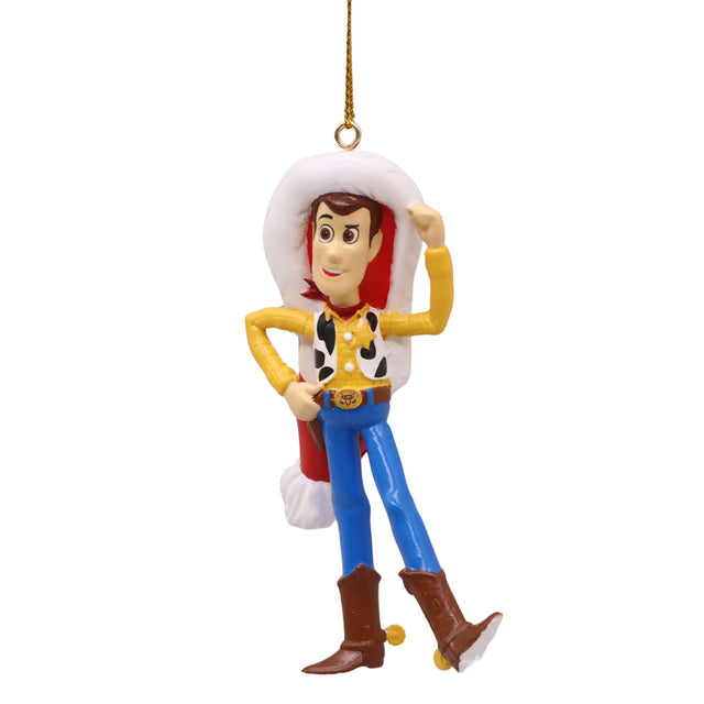 Hanging cowboy character Christmas ornament, red and blue outfit with white vest