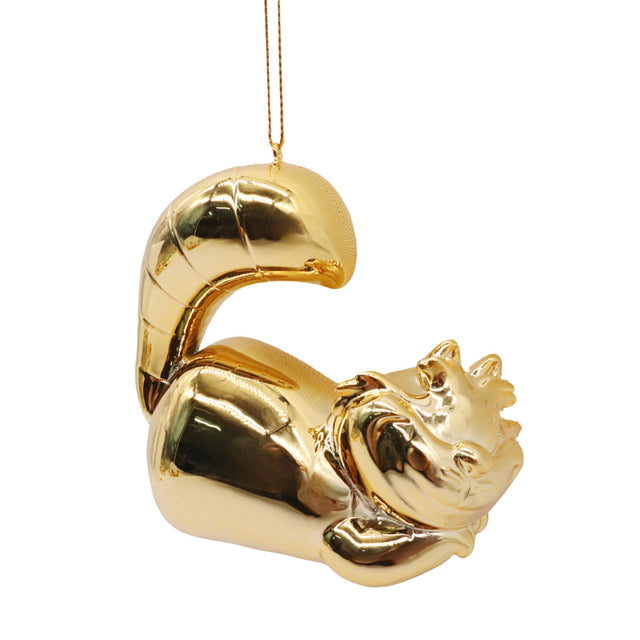 Gold Cheshire Cat hanging Christmas ornament with metallic cat face, curved body