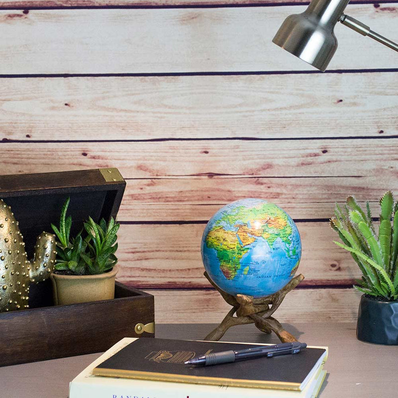 Blue Relief Map Mova Globe 6 inch displayed on wooden stand