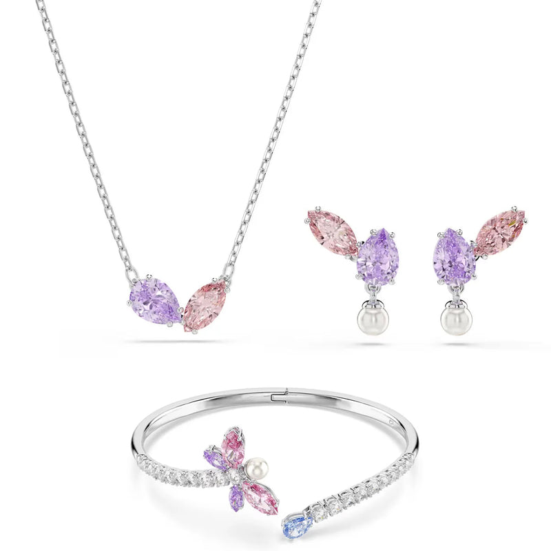 Rhodium-plated jewelry set with a crystal necklace, drop earrings, and dragonfly cuff bracelet