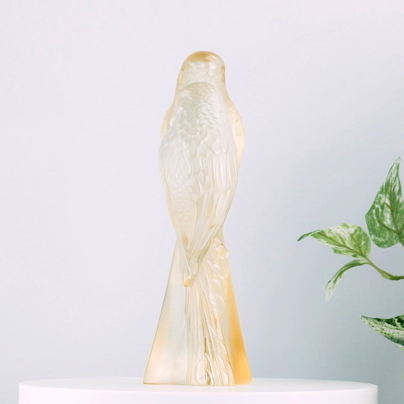 Lalique 2 Parakeets Gold Luster Crystal Sculpture with plants in the background