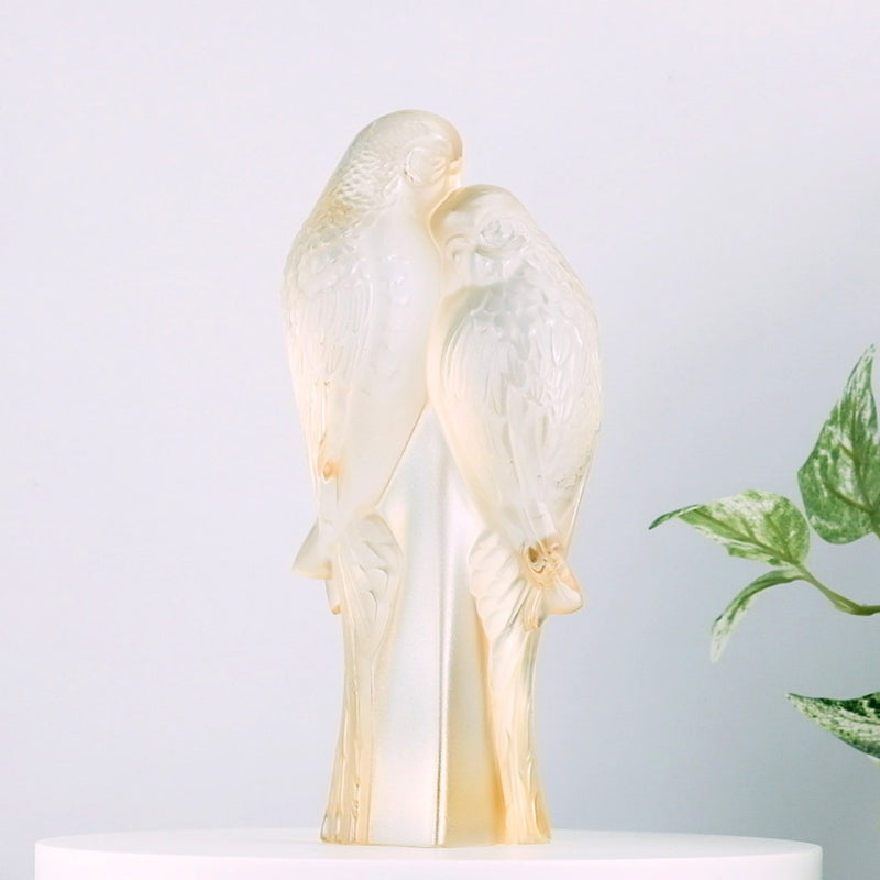 Lalique 2 Parakeets Gold Luster Crystal Sculpture with plants in the background