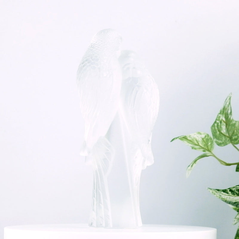 Lalique Two Parakeets with plants in the background