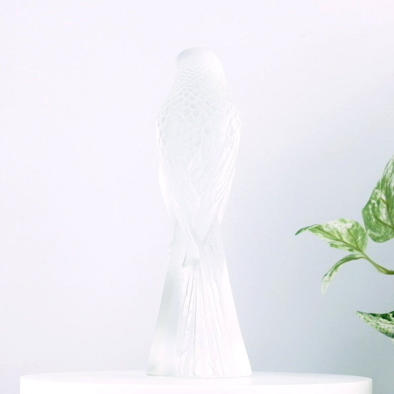 Lalique Two Parakeets with plants in the background