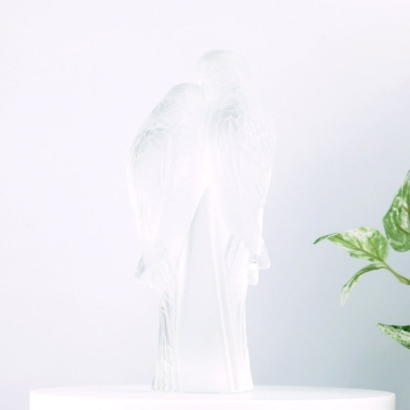 Lalique Two Parakeets with plants in the background