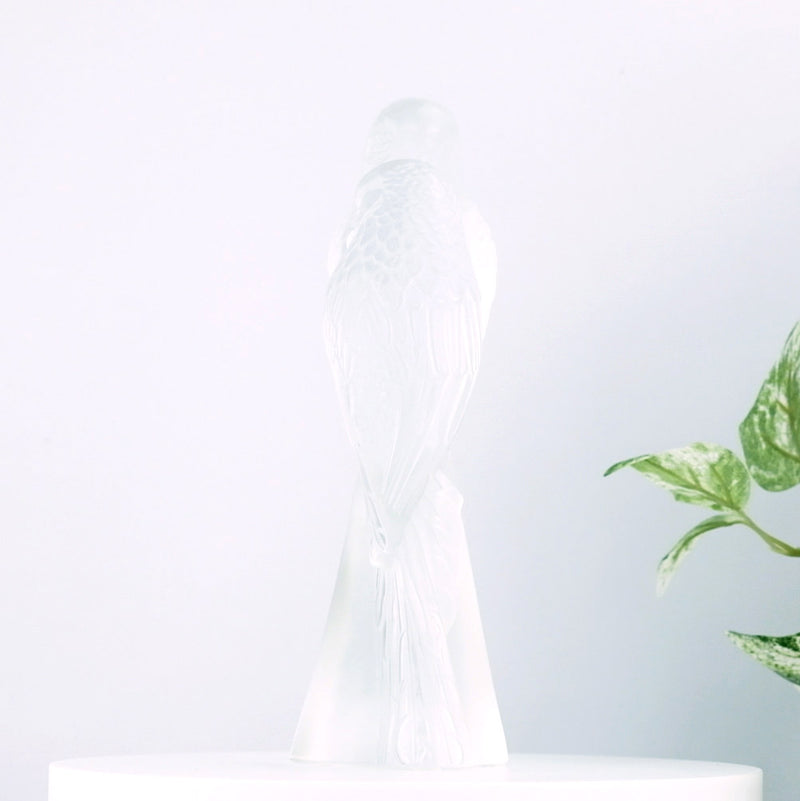 Lalique Two Parakeets with plants in the background