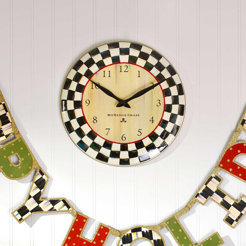Mackenzie Childs Courtly Check Enamel Clock on a wall