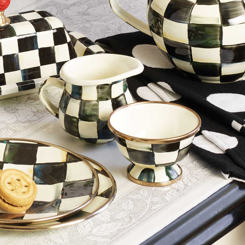 Mackenzie-Childs Courtly Check Enamel Little Creamer with tea and biscuits