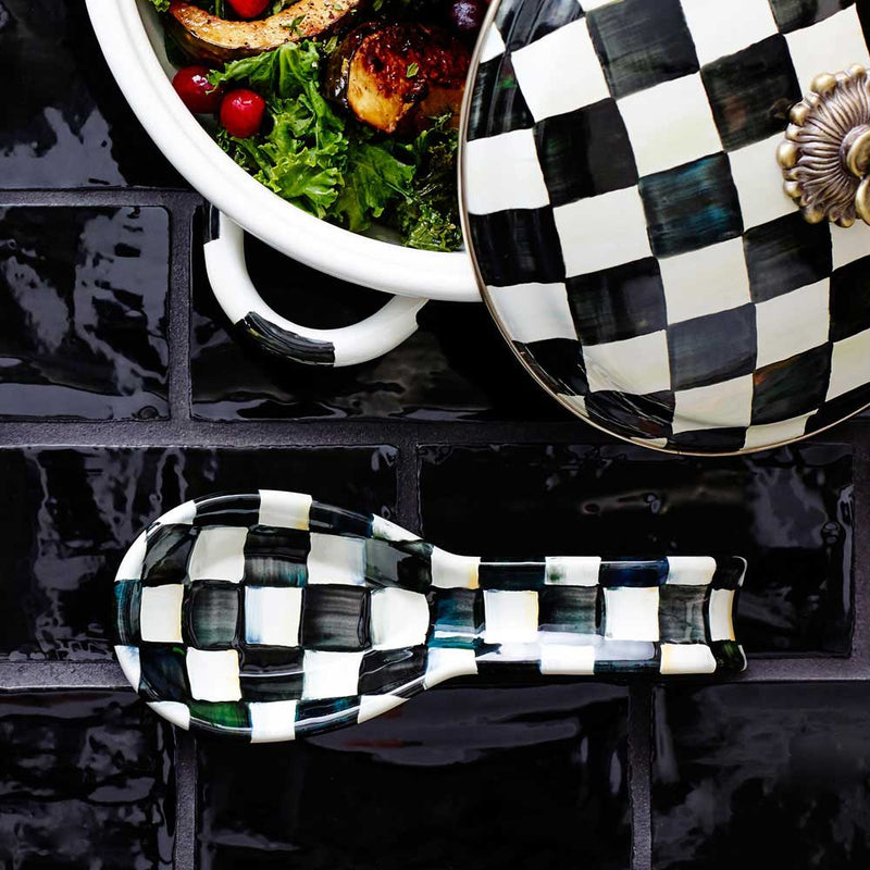 Mackenzie Childs Courtly Check Enamel Spoon Rest on a black tile