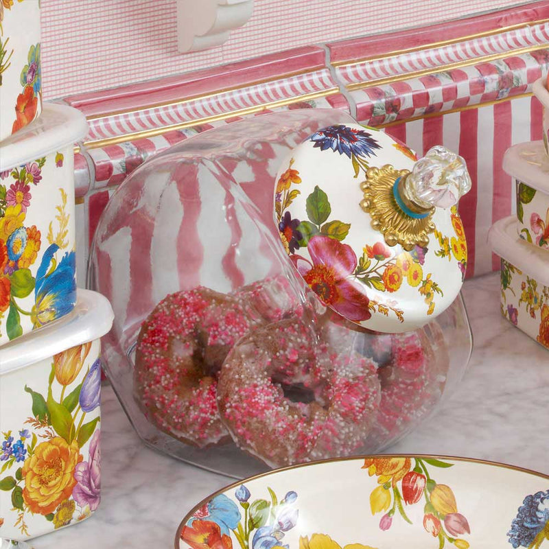 Mackenzie Childs White Flower Market Cookie Jar with Enamel Lid displayed with donuts