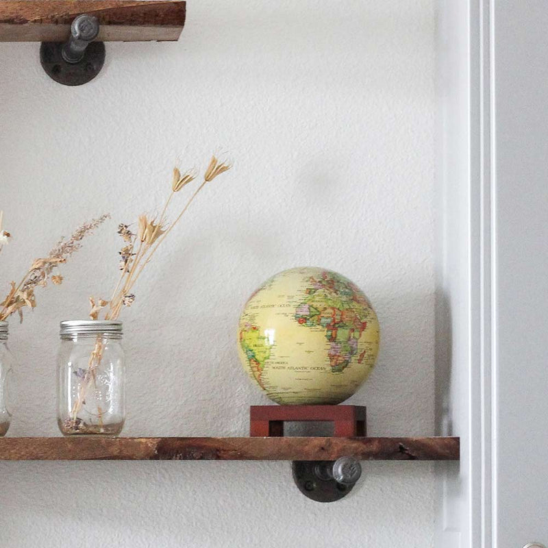 Mova Globe 8.5 inch Antique Beige on a wooden stand