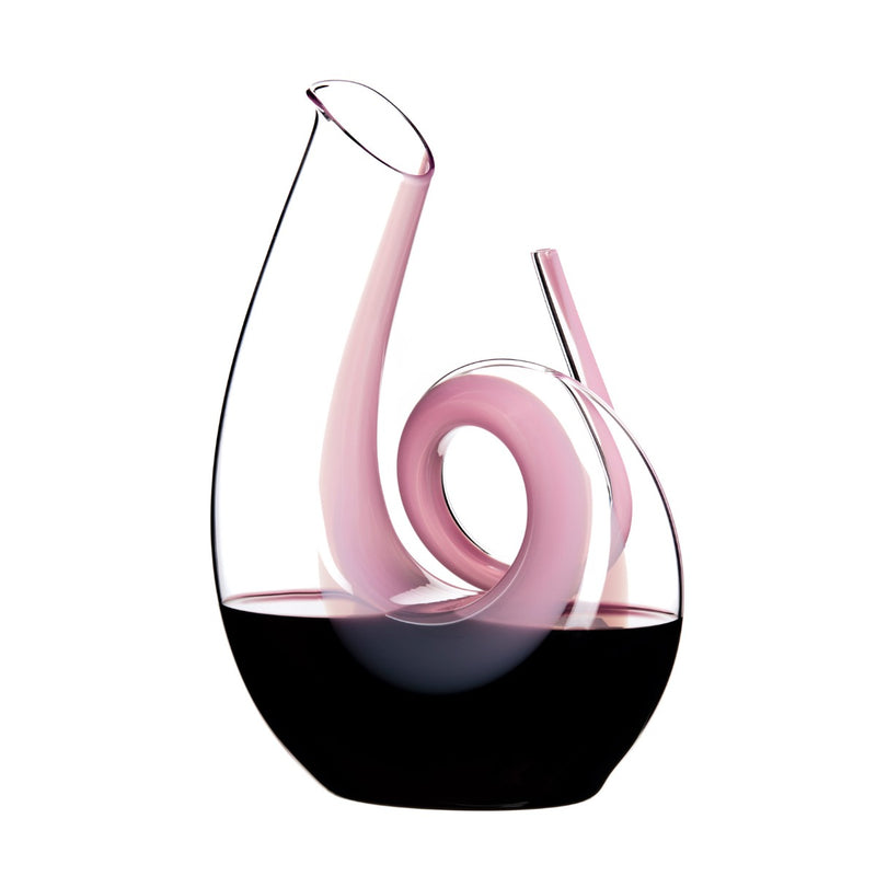 Riedel Crystal Pink Curly Decanter filled with red wine