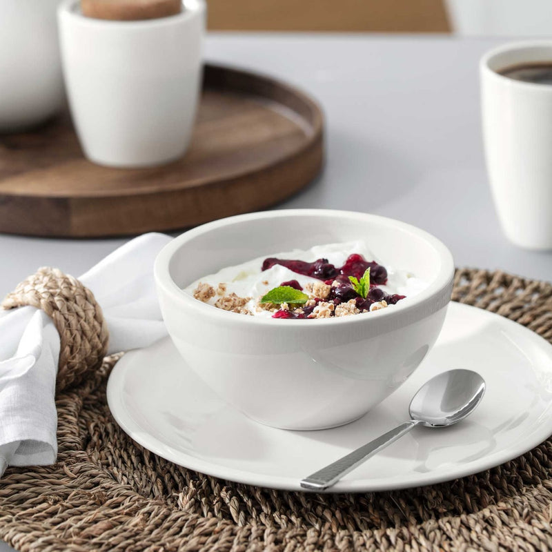 Villeroy & Boch Artesano Original Bowl filled with yoghurt and granola on a Villeroy & Boch Artesano Original side plate