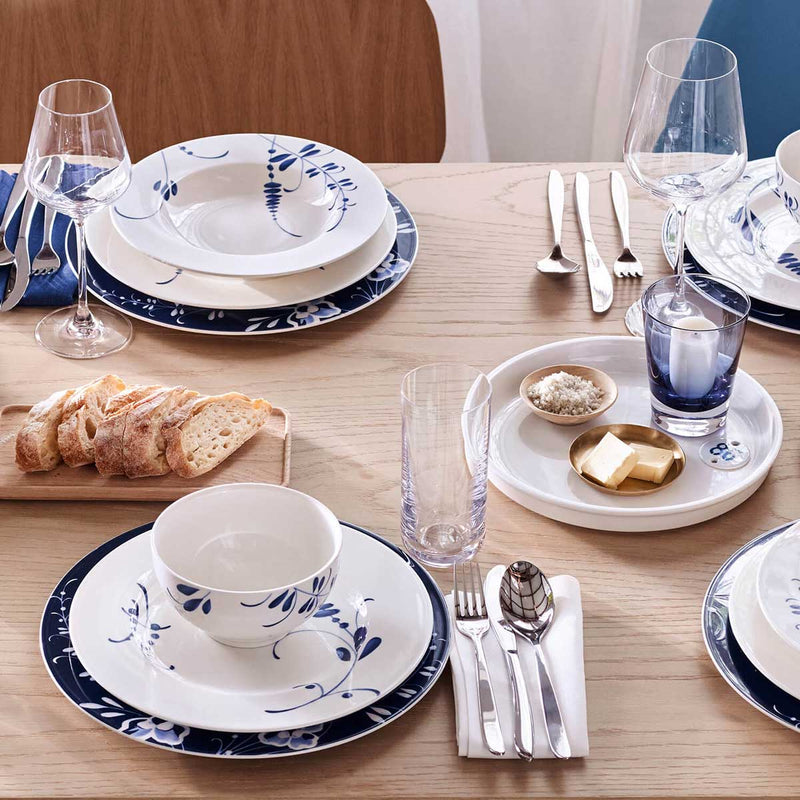 Villeroy and Boch La Divina Longdrink Glass filled with water on a table with Villeroy and Boch dining set
