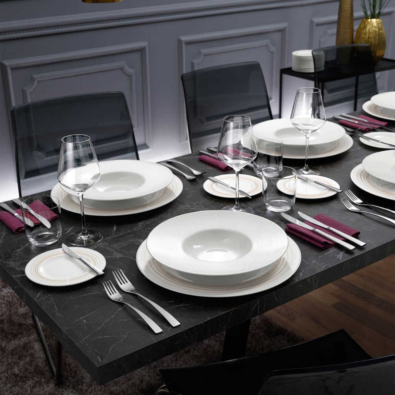 Villeroy & Boch La Divina Whisky Glass on a dining table with Villeroy & Boch plates and wine glasses