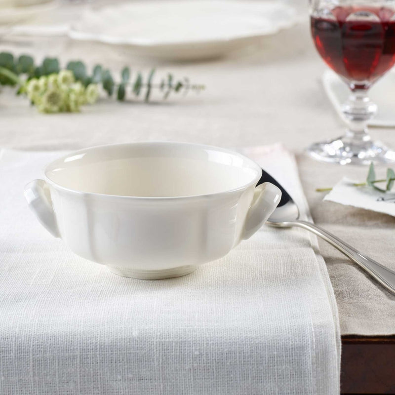 Villeroy & Boch Manoir 0.35l Soup Cup on a dining table with a Villeroy & Boch wine glass