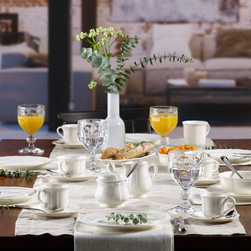 Villeroy & Boch Manoir 21cm Salad Plate on a dining table with Villeroy & Boch glasses