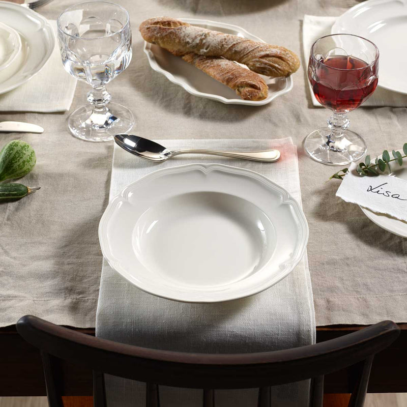 Villeroy and Boch Manoir 23cm Deep Plate on a dining table with Villeroy and Boch Manoir platter dish