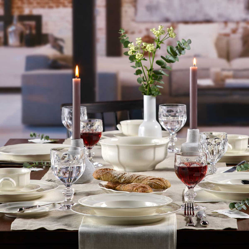 Villeroy and Boch Manoir 23cm Deep Plate on a dining table with Villeroy and Boch Manoir plates and Villeroy and Boch Glasses