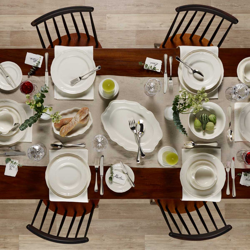 Villeroy and Boch Manoir 23cm Deep Plate on a dining table with Villeroy and Boch Manoir plates and Villeroy and Boch Glasses