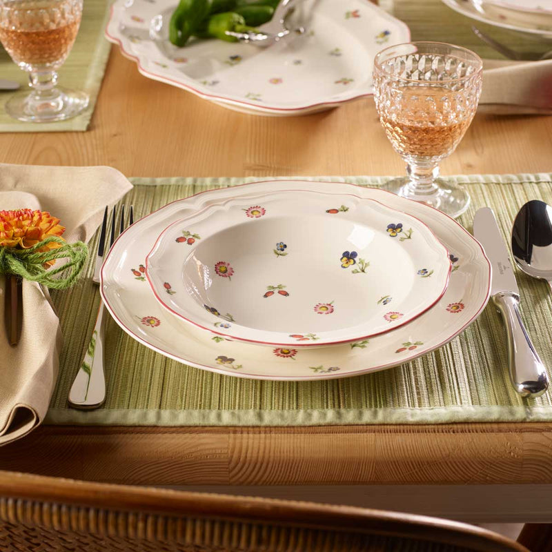 Villeroy & Boch Petite Fleur 20cm Deep Plate laid for dinner with a Villeroy & Boch Petite Fleur dinner plate and a Villeroy & Boch Boston glass