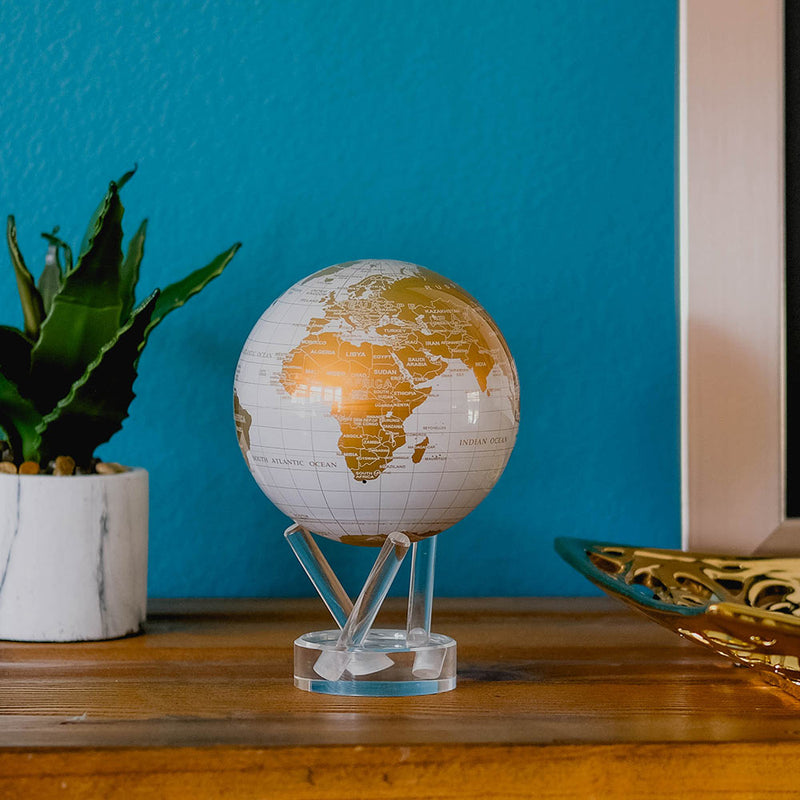 6 Inch white and gold Mova globe 